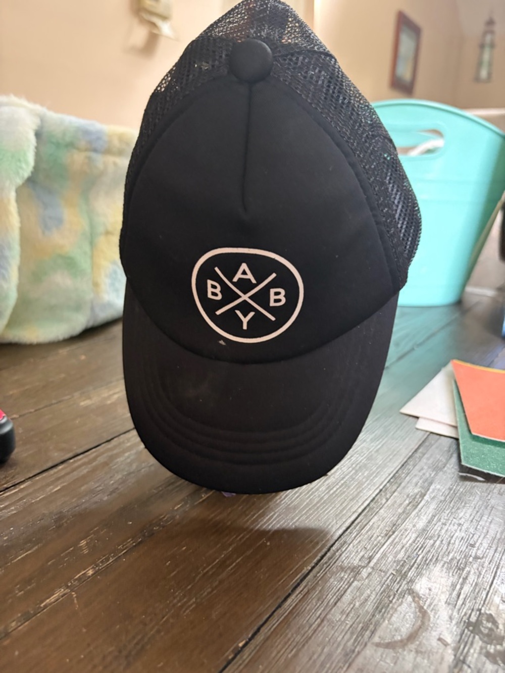 Black Trucker Cap with White 'BABY' Circle Logo